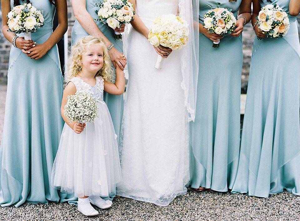 Nicole wearsa Stephanie Allin gown for her seafoam green inspired Summer wedding at Peterstone Court. Film photography by Victoria Phipps.