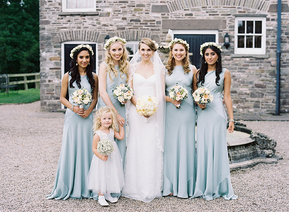 Nicole wearsa Stephanie Allin gown for her seafoam green inspired Summer wedding at Peterstone Court. Film photography by Victoria Phipps.