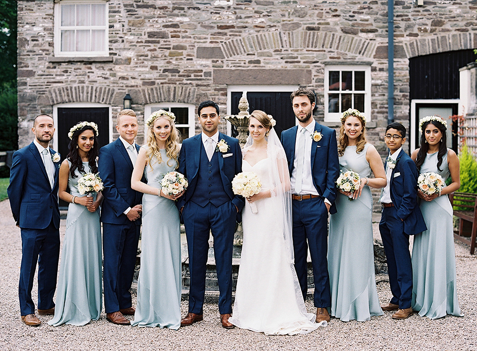 Nicole wearsa Stephanie Allin gown for her seafoam green inspired Summer wedding at Peterstone Court. Film photography by Victoria Phipps.