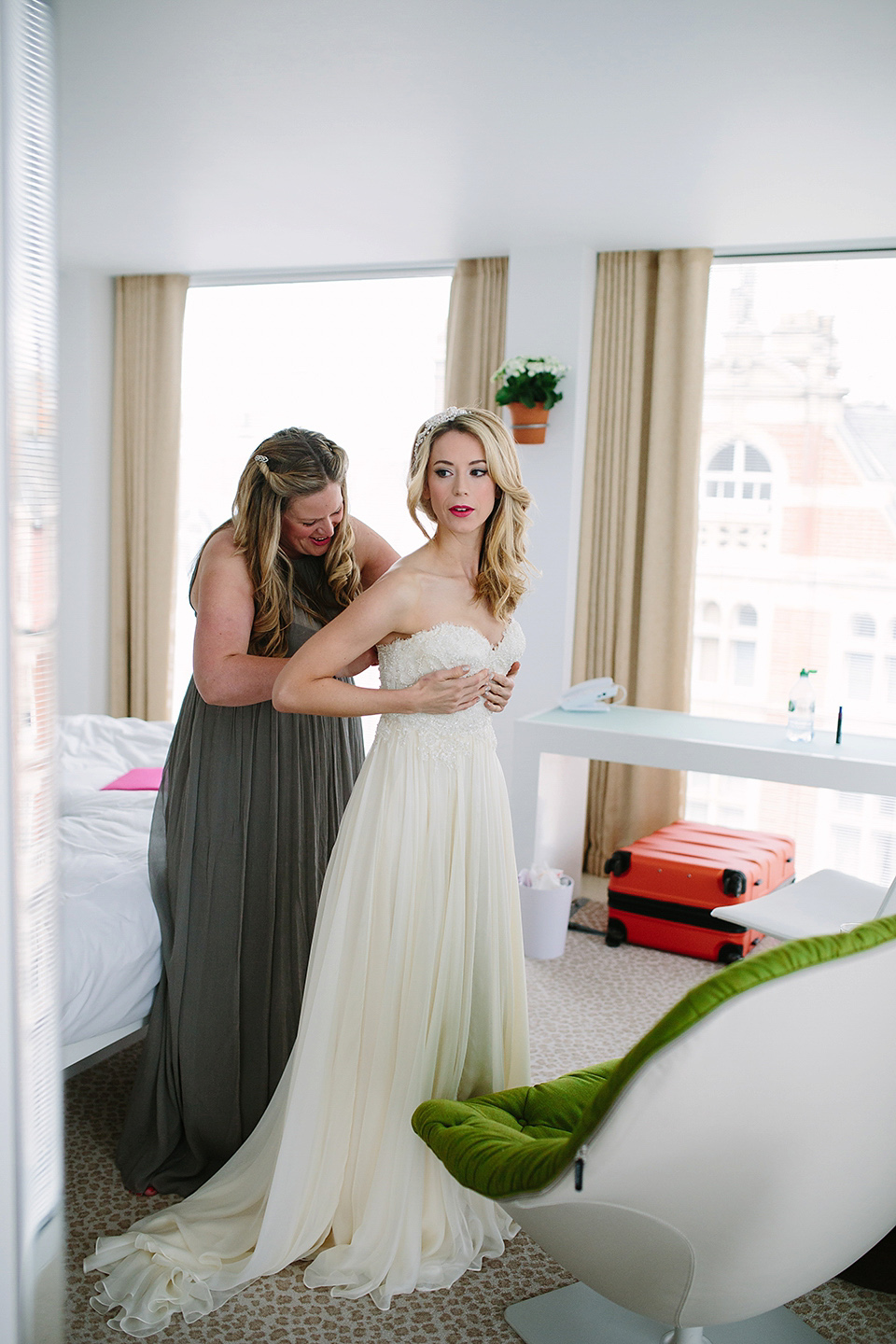 Kim wore a Leanne Marshall gown for her bright and colourful, art and science inspired wedding at RSA House in London. Photography by Hayley Savage.