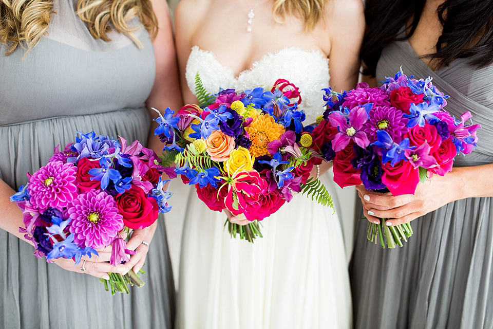 Kim wore a Leanne Marshall gown for her bright and colourful, art and science inspired wedding at RSA House in London. Photography by Hayley Savage.