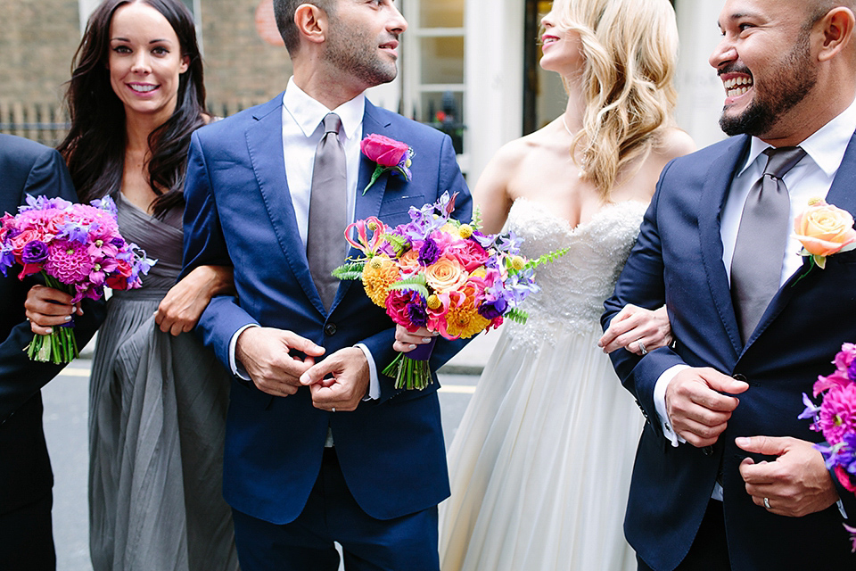 Kim wore a Leanne Marshall gown for her bright and colourful, art and science inspired wedding at RSA House in London. Photography by Hayley Savage.