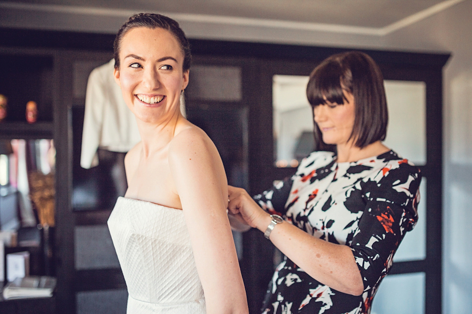 An Emelia Wickstead jumpsuit for a modern day wedding at the Baltic Centre for Contemporary Arts. Photography by Katy Melling.