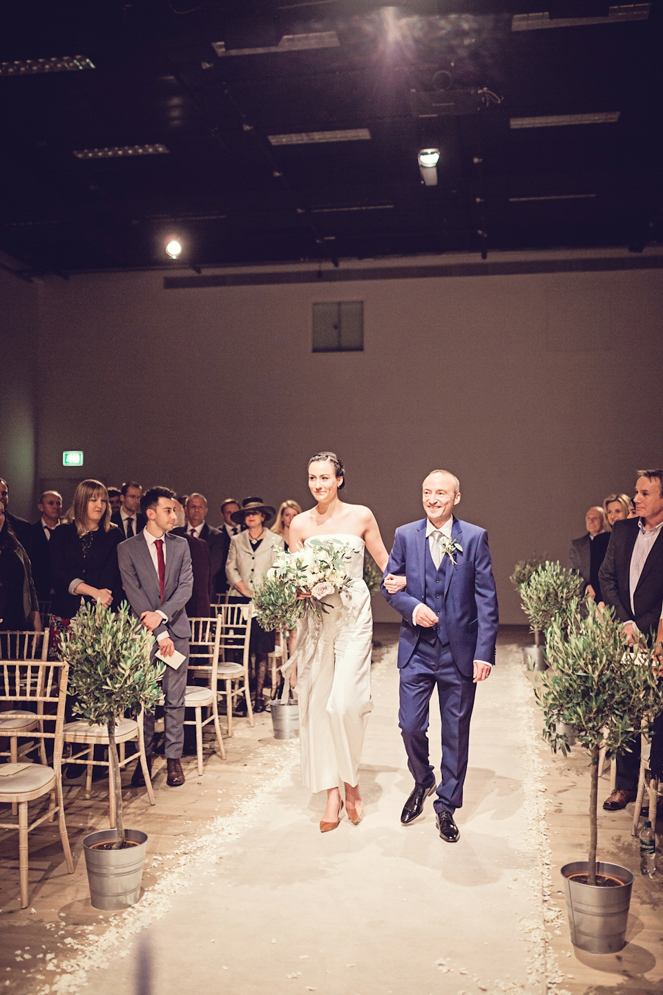 An Emelia Wickstead jumpsuit for a modern day wedding at the Baltic Centre for Contemporary Arts. Photography by Katy Melling.