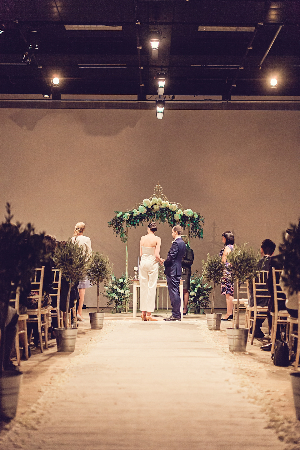 An Emelia Wickstead jumpsuit for a modern day wedding at the Baltic Centre for Contemporary Arts. Photography by Katy Melling.