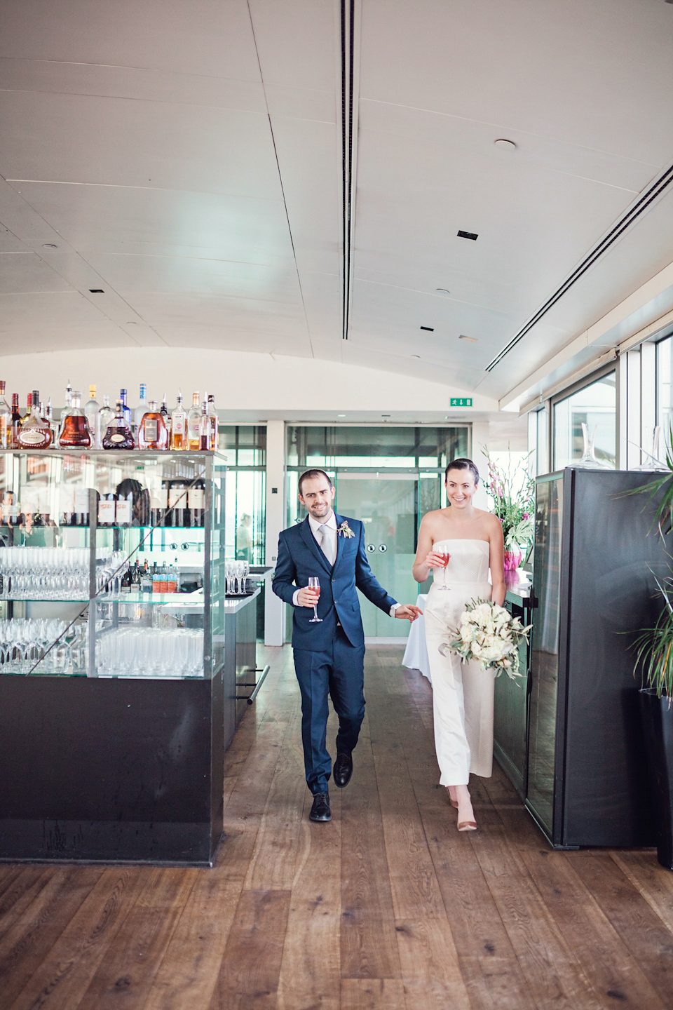 An Emelia Wickstead jumpsuit for a modern day wedding at the Baltic Centre for Contemporary Arts. Photography by Katy Melling.