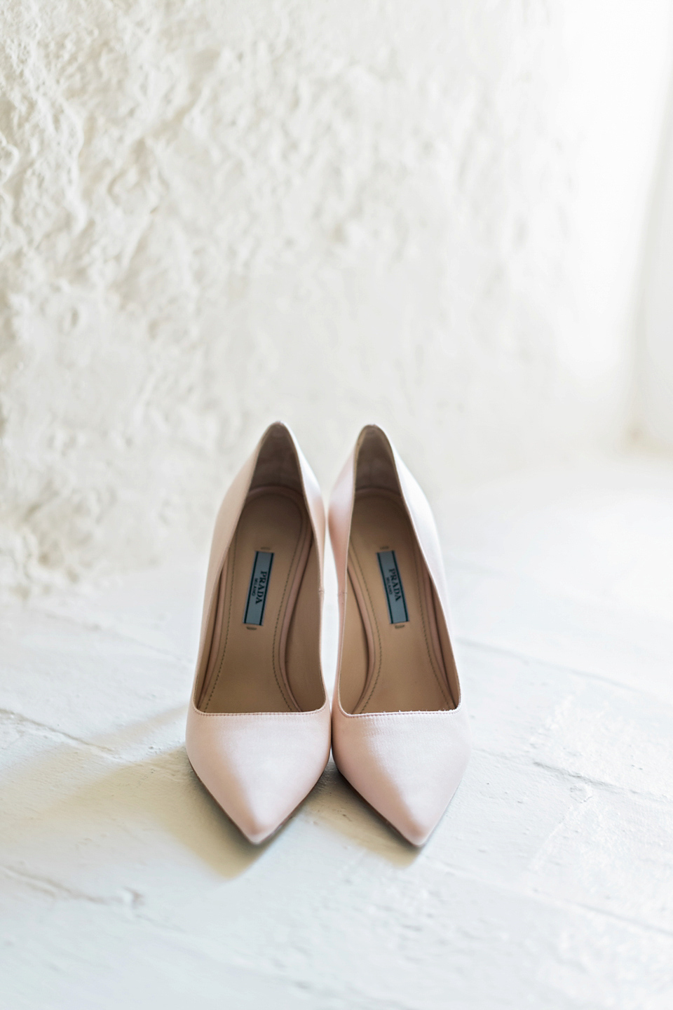 A Marchesa dress and Prada shoes for an elegant English country wedding at Farnham Castle. Photography by Dominique Bader.