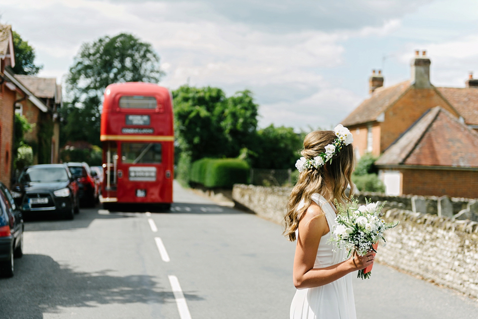 A Marchesa dress and Prada shoes for an elegant English country wedding at Farnham Castle. Photography by Dominique Bader.