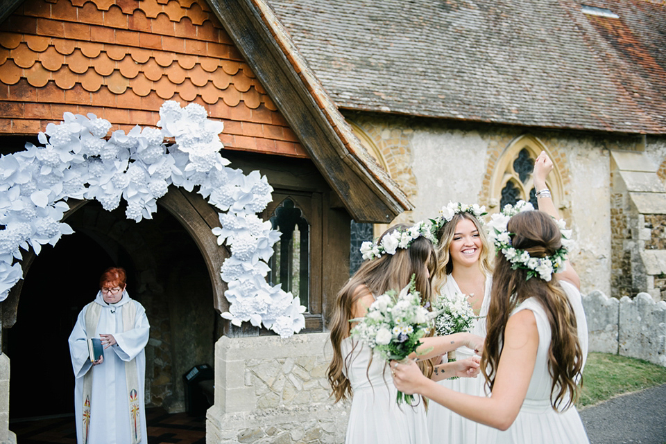 A Marchesa dress and Prada shoes for an elegant English country wedding at Farnham Castle. Photography by Dominique Bader.