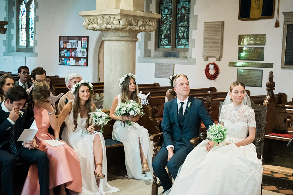 A Marchesa dress and Prada shoes for an elegant English country wedding at Farnham Castle. Photography by Dominique Bader.