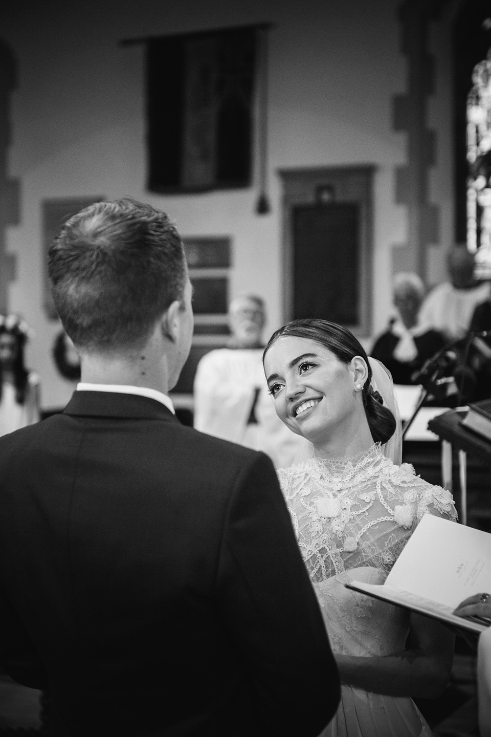 A Marchesa dress and Prada shoes for an elegant English country wedding at Farnham Castle. Photography by Dominique Bader.