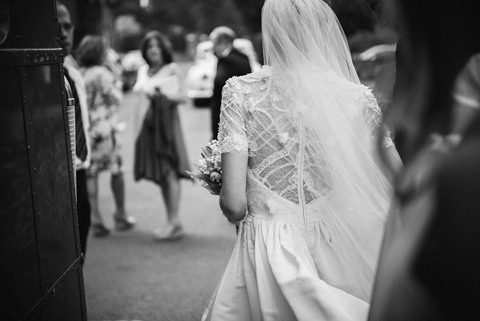 A Marchesa dress and Prada shoes for an elegant English country wedding at Farnham Castle. Photography by Dominique Bader.