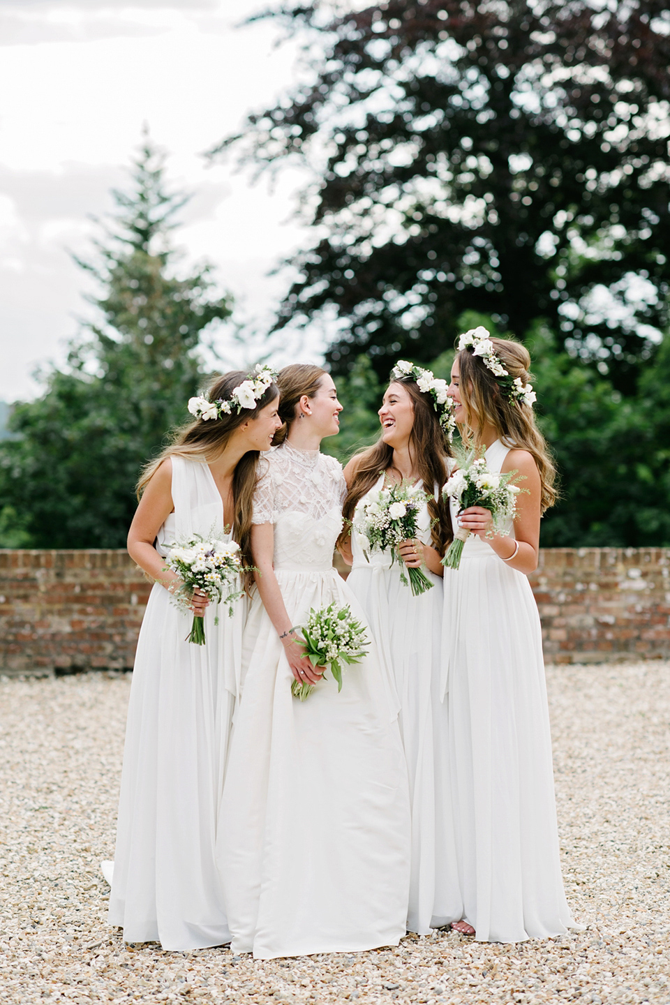 A Marchesa dress and Prada shoes for an elegant English country wedding at Farnham Castle. Photography by Dominique Bader.