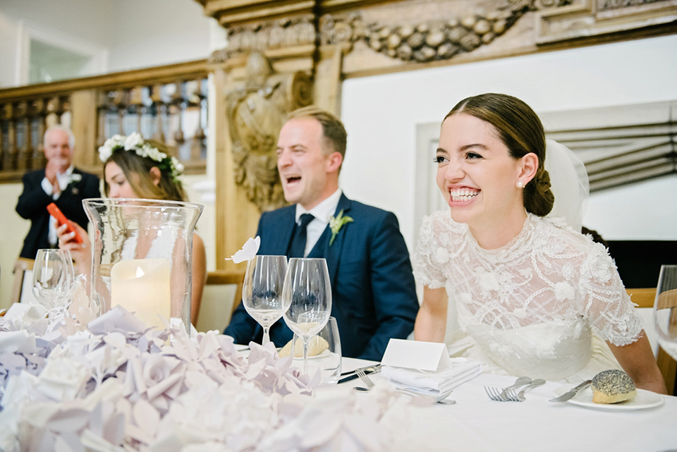 A Marchesa dress and Prada shoes for an elegant English country wedding at Farnham Castle. Photography by Dominique Bader.