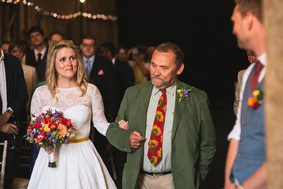 A tea length gown for a colourful, street food, summer party wedding. Photography by Kristian Leven.