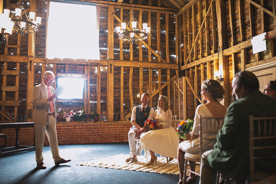 A tea length gown for a colourful, street food, summer party wedding. Photography by Kristian Leven.