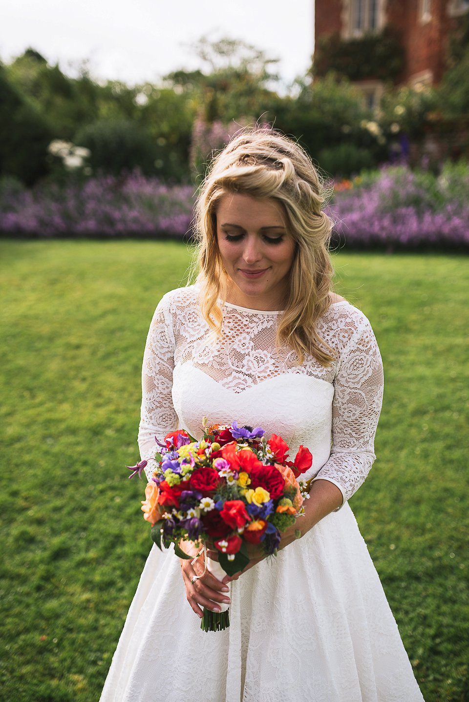 A tea length gown for a colourful, street food, summer party wedding. Photography by Kristian Leven.