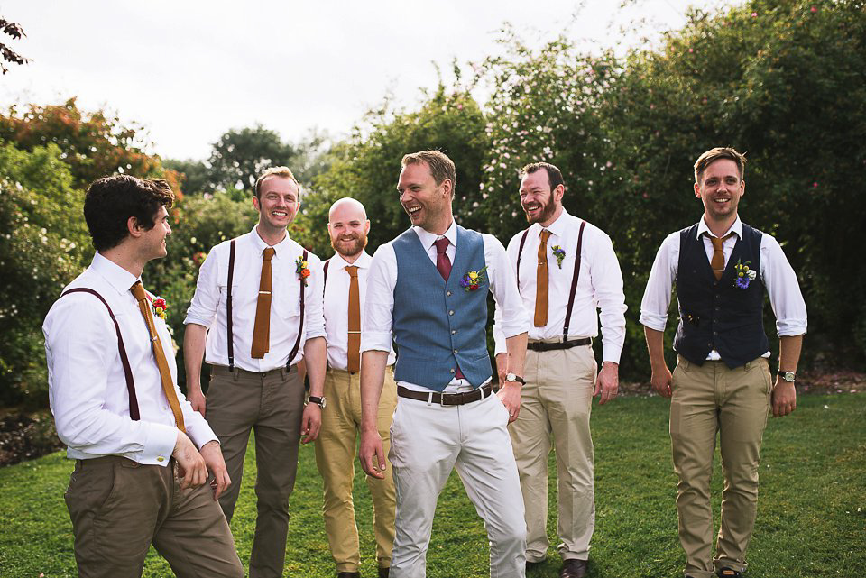 A tea length gown for a colourful, street food, summer party wedding. Photography by Kristian Leven.