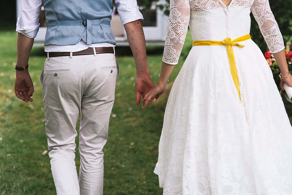 A tea length gown for a colourful, street food, summer party wedding. Photography by Kristian Leven.