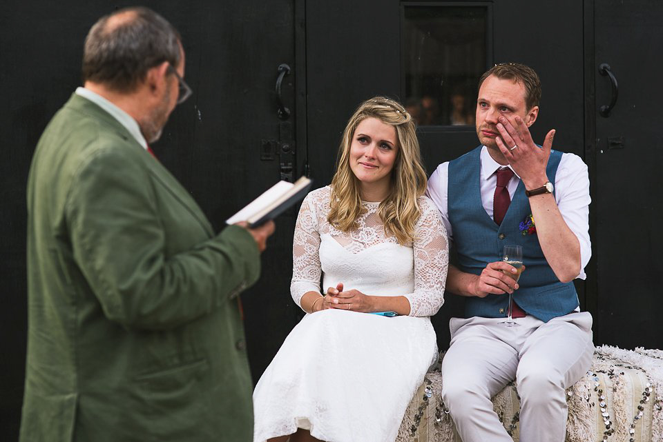 A tea length gown for a colourful, street food, summer party wedding. Photography by Kristian Leven.