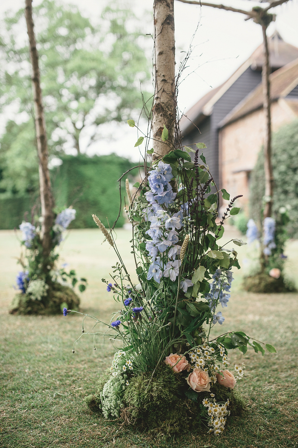 A modern Jewish wedding - the bride wears a gown by Wilden Bride. Photography by Kat Hill.