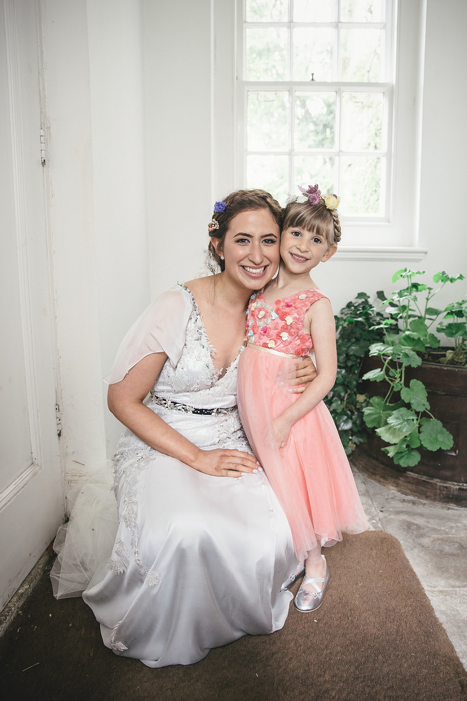 A modern Jewish wedding - the bride wears a gown by Wilden Bride. Photography by Kat Hill.