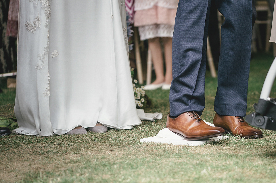 A modern Jewish wedding - the bride wears a gown by Wilden Bride. Photography by Kat Hill.