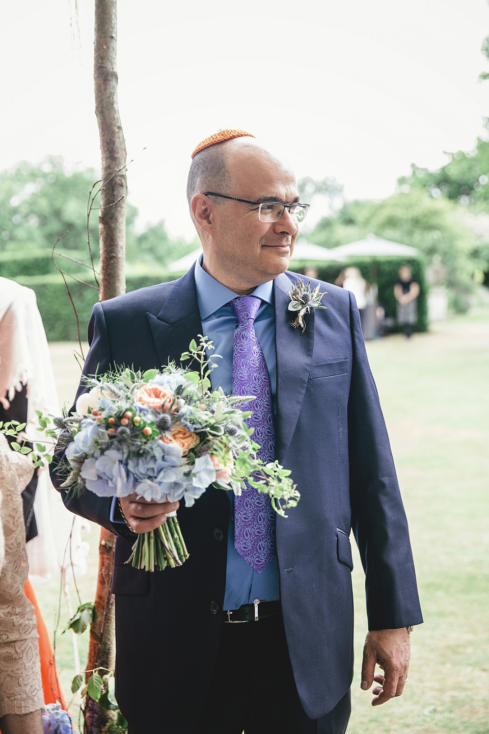 A modern Jewish wedding - the bride wears a gown by Wilden Bride. Photography by Kat Hill.