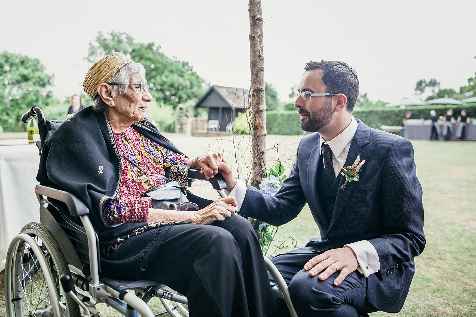 A modern Jewish wedding - the bride wears a gown by Wilden Bride. Photography by Kat Hill.