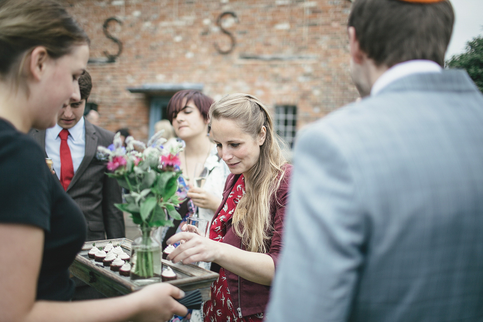 A modern Jewish wedding - the bride wears a gown by Wilden Bride. Photography by Kat Hill.