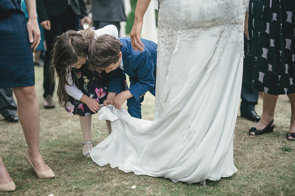 A modern Jewish wedding - the bride wears a gown by Wilden Bride. Photography by Kat Hill.