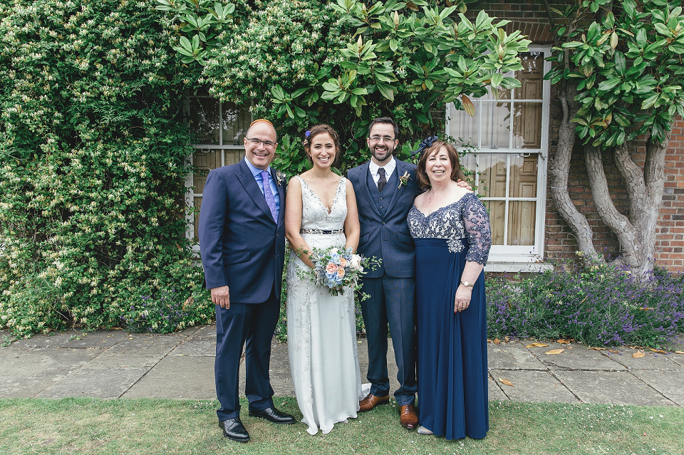 A modern Jewish wedding - the bride wears a gown by Wilden Bride. Photography by Kat Hill.