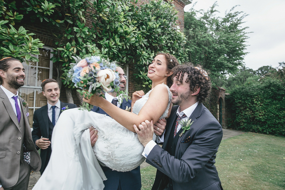 A modern Jewish wedding - the bride wears a gown by Wilden Bride. Photography by Kat Hill.