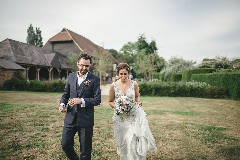 A modern Jewish wedding - the bride wears a gown by Wilden Bride. Photography by Kat Hill.