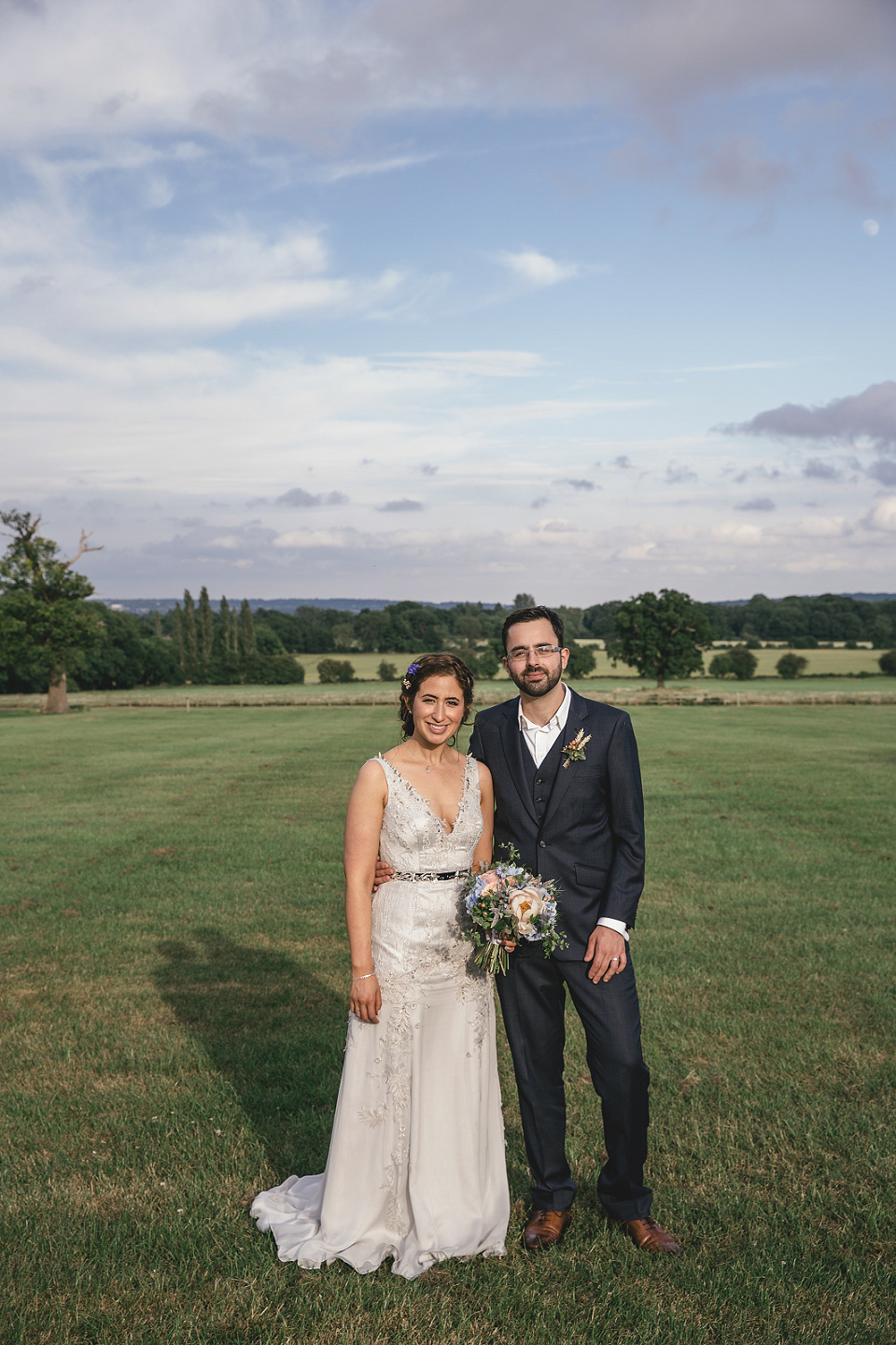 A modern Jewish wedding - the bride wears a gown by Wilden Bride. Photography by Kat Hill.