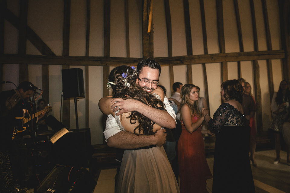 A modern Jewish wedding - the bride wears a gown by Wilden Bride. Photography by Kat Hill.