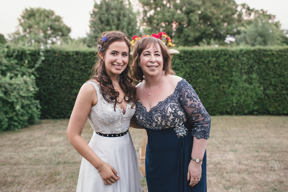 A modern Jewish wedding - the bride wears a gown by Wilden Bride. Photography by Kat Hill.