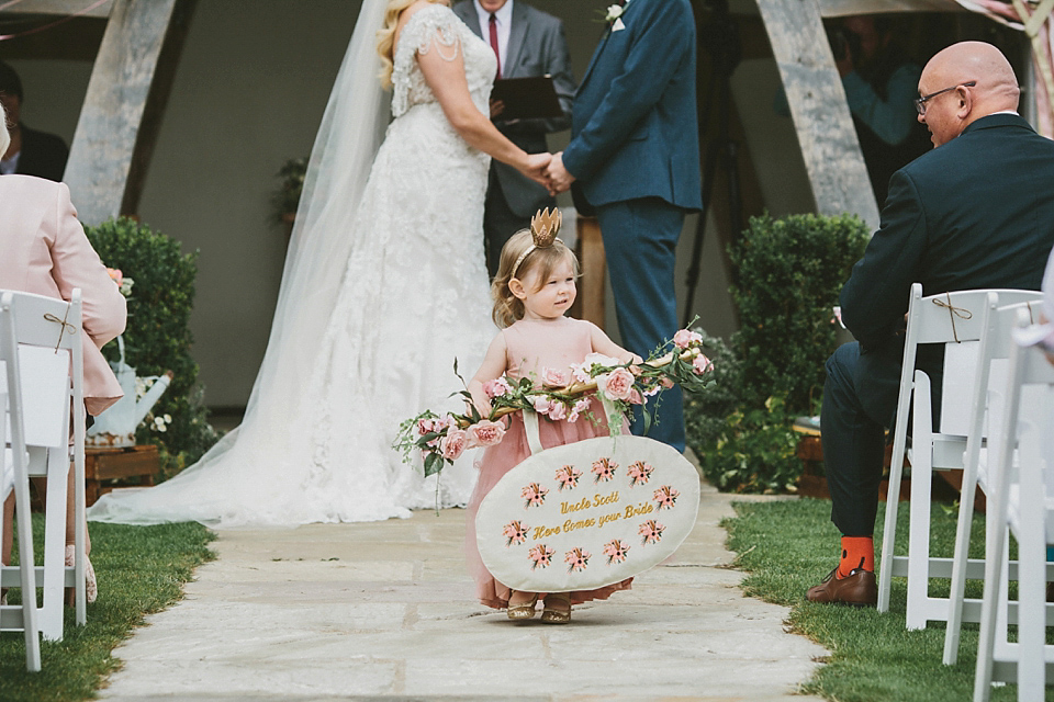 Terri wore an Anna Campbell inspired gown made by her mum, for her outdoor Summer wedding in the Cotswolds. Photography by McKinley Rodgers, film by Story Catchers Wedding Films.