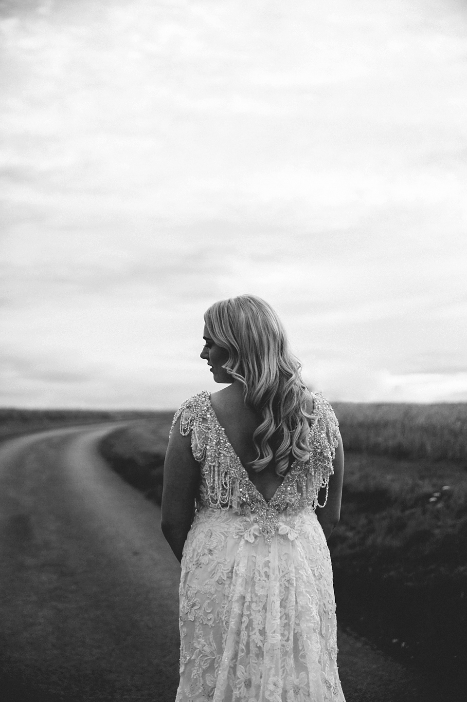 Terri wore an Anna Campbell inspired gown made by her mum, for her outdoor Summer wedding in the Cotswolds. Photography by McKinley Rodgers, film by Story Catchers Wedding Films.