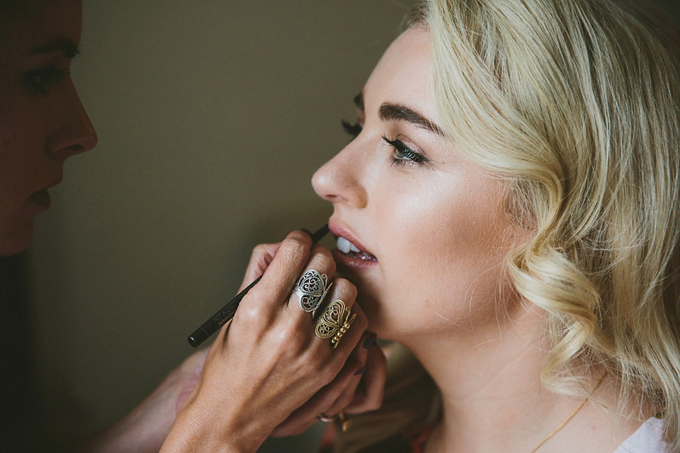 Terri wore an Anna Campbell inspired gown made by her mum, for her outdoor Summer wedding in the Cotswolds. Photography by McKinley Rodgers, film by Story Catchers Wedding Films.