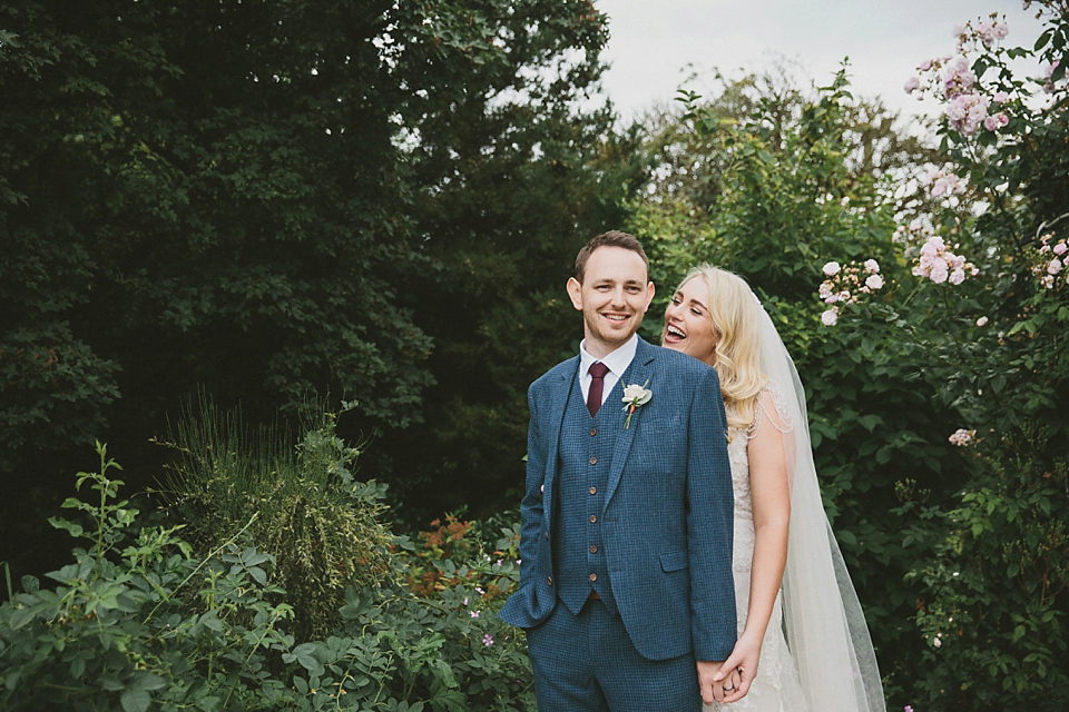 Terri wore an Anna Campbell inspired gown made by her mum, for her outdoor Summer wedding in the Cotswolds. Photography by McKinley Rodgers, film by Story Catchers Wedding Films.