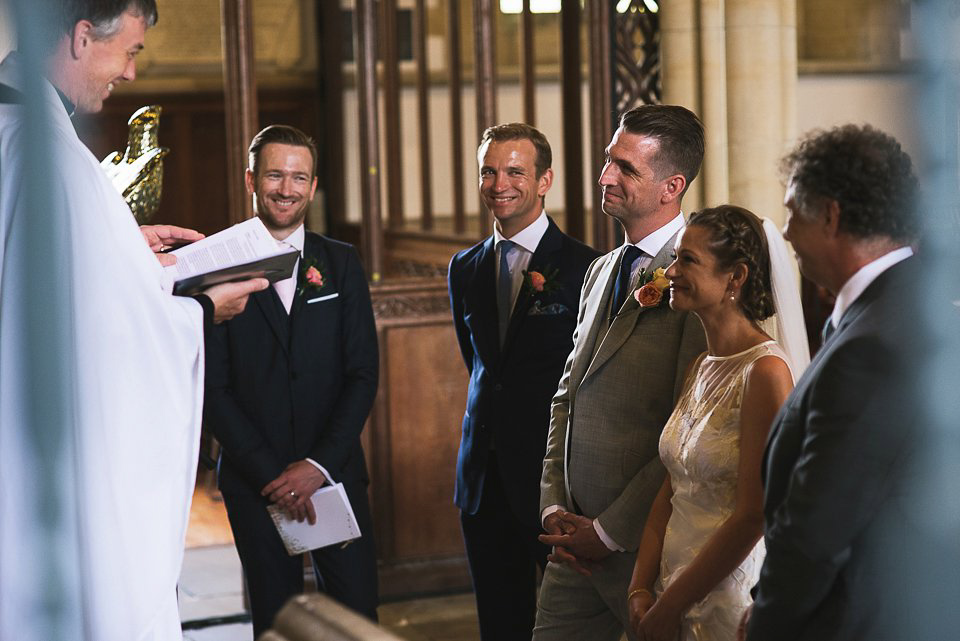 Bryony wore a gown with a floral back by Claire Pettibone from Blackburn Bridal for her Summer wedding held at her husband's family home. Photography by Kristian Leven.