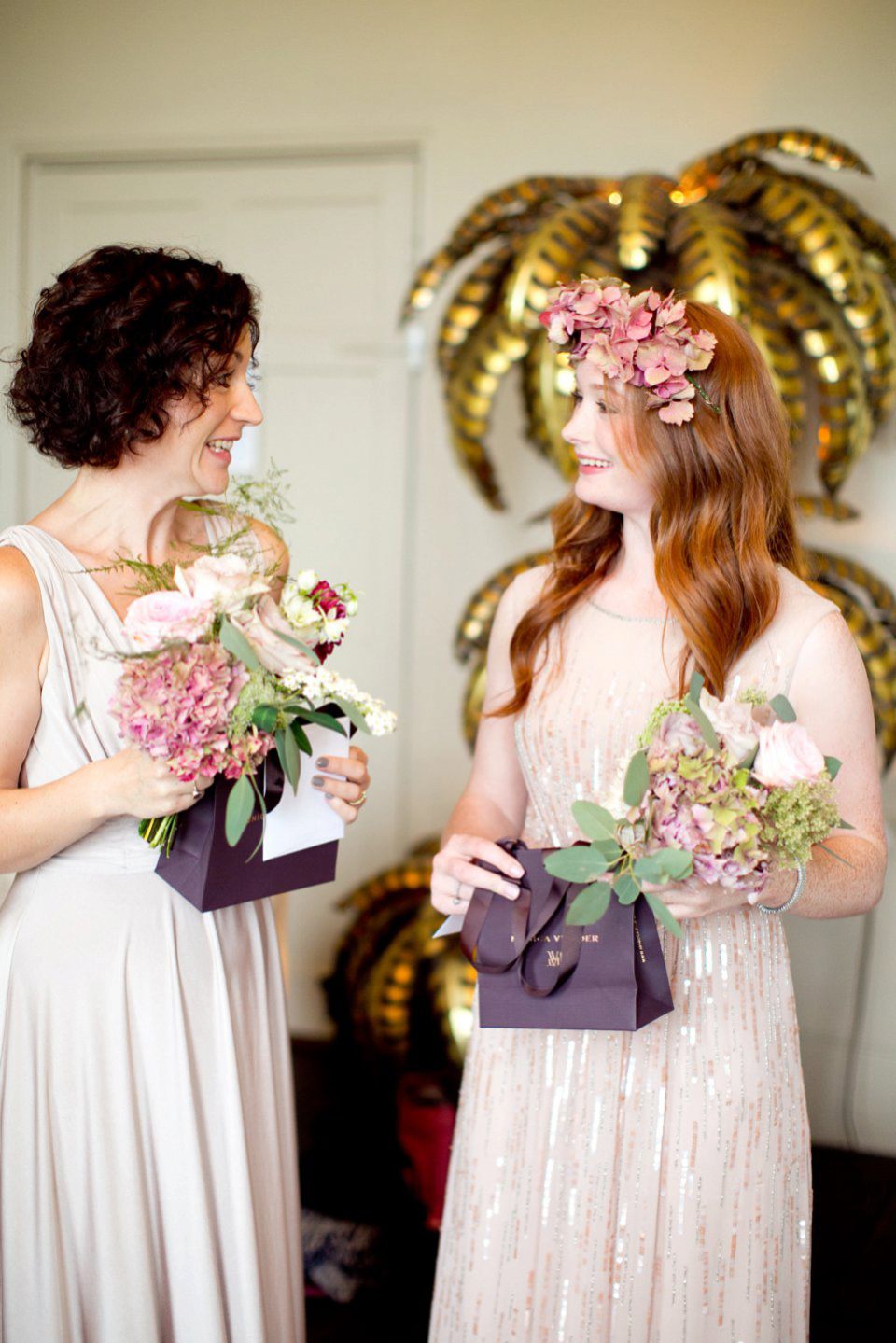 George wears a Temperley London gown with beautiful peplum detail for her eccentric, quirky and elegant Aynhoe Park wedding. Photography by Caught The Light.