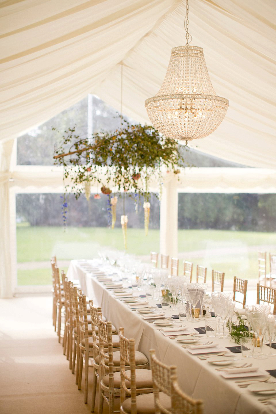 George wears a Temperley London gown with beautiful peplum detail for her eccentric, quirky and elegant Aynhoe Park wedding. Photography by Caught The Light.