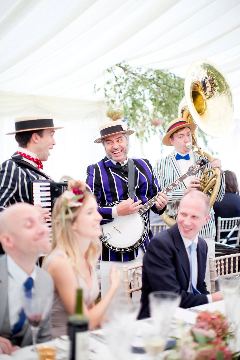 George wears a Temperley London gown with beautiful peplum detail for her eccentric, quirky and elegant Aynhoe Park wedding. Photography by Caught The Light.