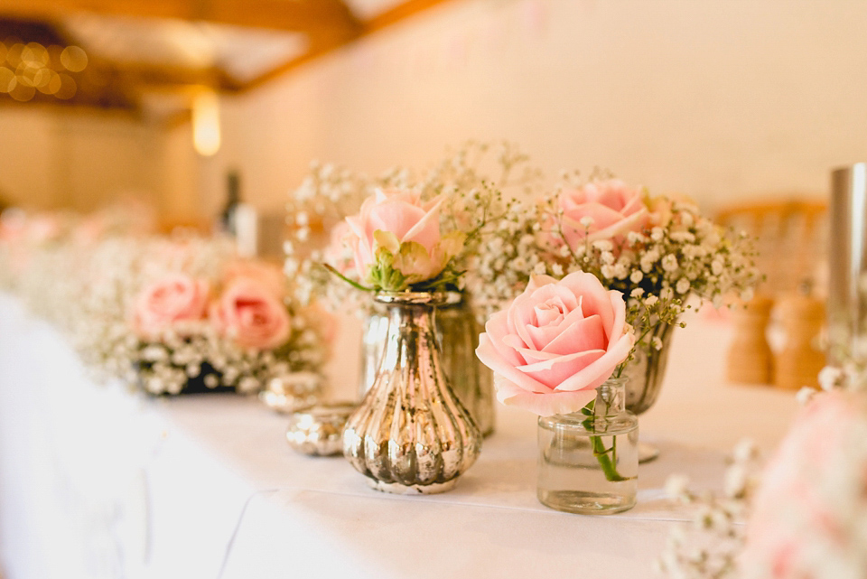 Rebecca wore a gown by Charlotte Balbier for her romantic and quintessentially English country wedding. Photography by Lisa Carpenter.