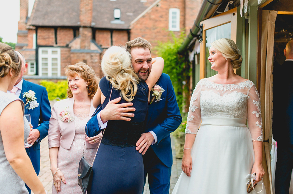 Rebecca wore a gown by Charlotte Balbier for her romantic and quintessentially English country wedding. Photography by Lisa Carpenter.