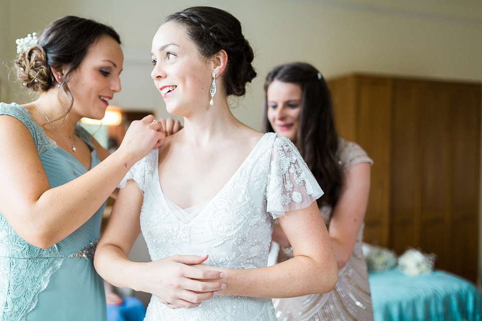 Holly wore an Eliza Jane Howell gown for her colourful, outdoor wedding in Scotland. Images by Solen Photography.