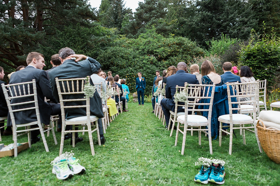 Holly wore an Eliza Jane Howell gown for her colourful, outdoor wedding in Scotland. Images by Solen Photography.