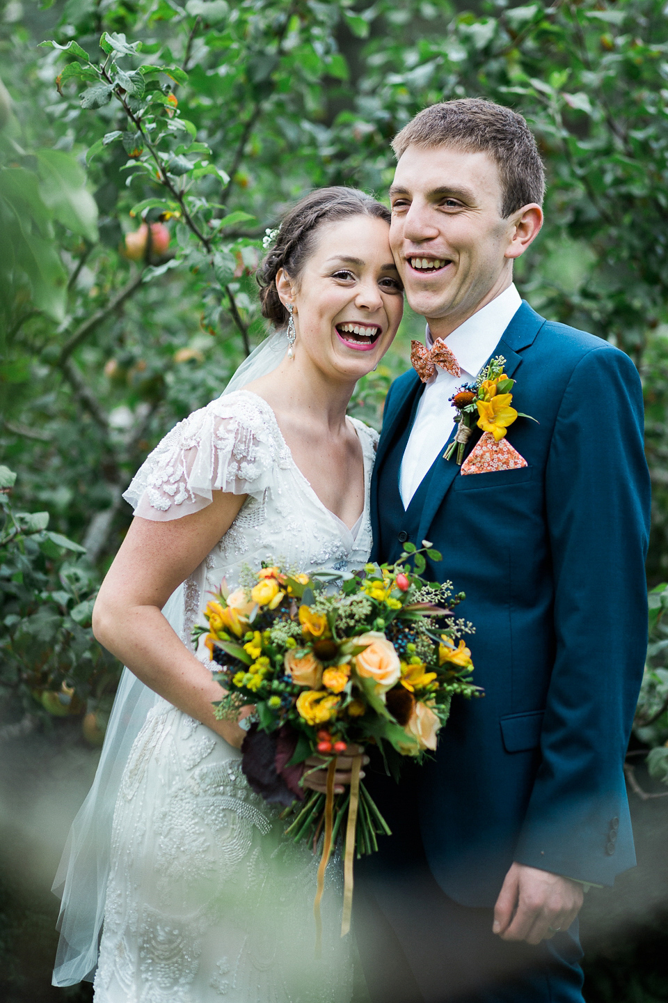 Holly wore an Eliza Jane Howell gown for her colourful, outdoor wedding in Scotland. Images by Solen Photography.